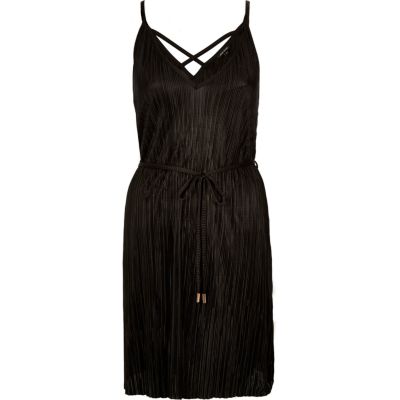 Black pleated swing dress